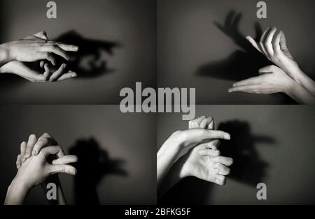 Hände Geste wie verschiedene Tiere und Figuren auf grauem Hintergrund Stockfoto