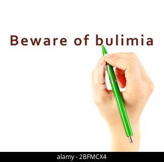 Menschlicher Handschrifttext Vorsicht vor Bulimia auf transparentem Whiteboard Stockfoto