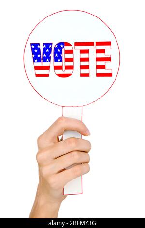 Hand halten Stimmzeichen isoliert auf weiß Stockfoto