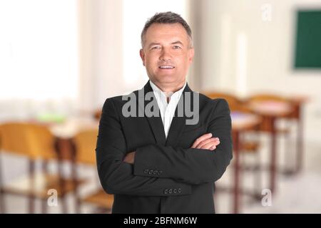 Inhaber des Geschäfts an seiner Privatschule Stockfoto