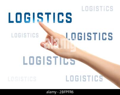 Logistikkonzept. Weibliche Hand zeigt auf Text vor weißem Hintergrund Stockfoto