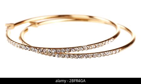 Schöne goldene Ohrringe mit Diamant isoliert auf weiß Stockfoto