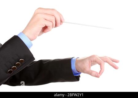 Musikdirigent Hände mit Schlagstock isoliert auf weiß Stockfoto