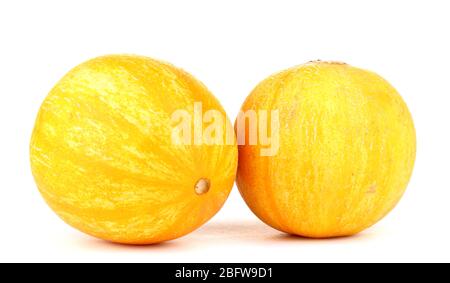 Reife Melonen auf Weiß isoliert Stockfoto