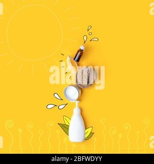 Kreatives Konzept umweltfreundlicher natürlicher Reinigungsmittel auf gelbem Küchentisch: Soda, ätherische Öle, Zellulose-Schwamm, Lumpen, Zitrone, Seife, Essig Stockfoto