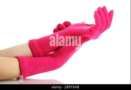 Frau gestrickte Handschuhe an den Händen, isoliert auf weiß Stockfoto