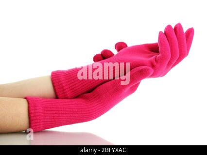 Frau gestrickte Handschuhe an den Händen, isoliert auf weiß Stockfoto