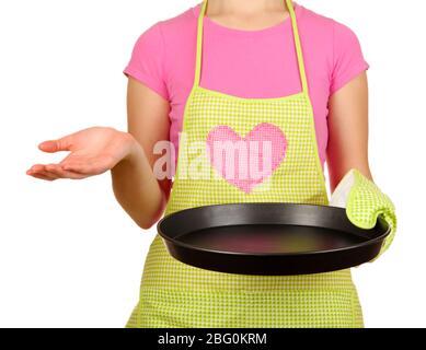 Nahaufnahme der Hausfrau in Schürze halten Pfanne auf weiß isoliert Stockfoto