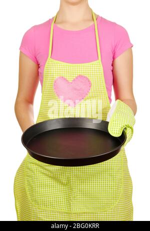Nahaufnahme der Hausfrau in Schürze halten Pfanne auf weiß isoliert Stockfoto