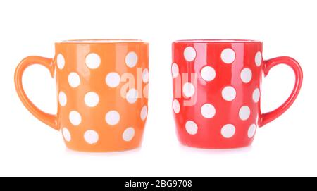 Farbe polka dot Tassen isoliert auf weiß Stockfoto