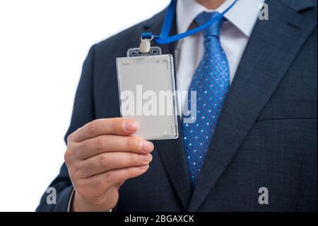 Geschäftsmann im Anzug tragen eine leere ID Tags oder Name-Karte auf ein Schlüsselband auf einer Messe oder Konferenz Stockfoto