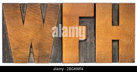 WFH (Arbeit von zu Hause) Akronym Wort abstrakt in Vintage Buchdruck Holzart, Telearbeit Konzept Stockfoto