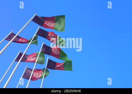 Afghanistan-Flaggen winken im Wind gegen einen blauen Himmel. 3D-Rendering Stockfoto