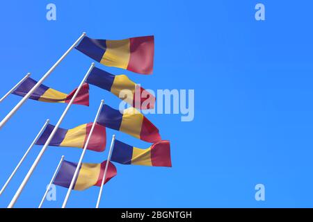 Rumänien Fahnen winken im Wind gegen einen blauen Himmel. 3D-Rendering Stockfoto