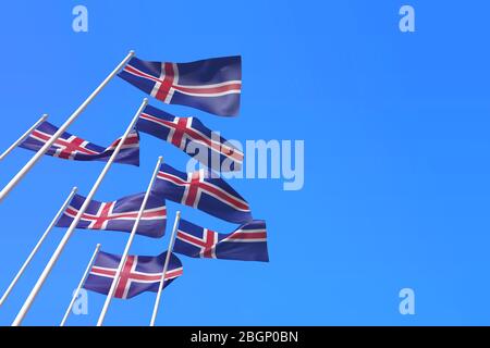 Island Fahnen winken im Wind gegen einen blauen Himmel. 3D-Rendering Stockfoto