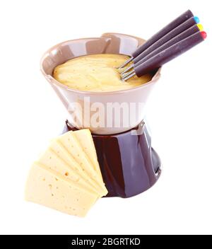 Fondue und Scheiben Käse auf weiß isoliert Stockfoto