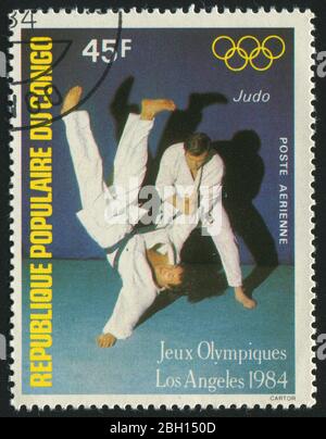 KONGO - UM 1984: Briefmarke gedruckt von Kongo, zeigt Judo Kampf, um 1984. Stockfoto