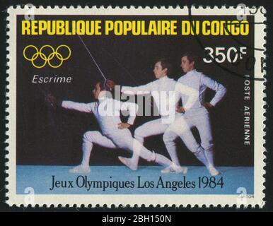 KONGO - UM 1984: Briefmarke gedruckt von Kongo, zeigt Fechten, um 1984. Stockfoto