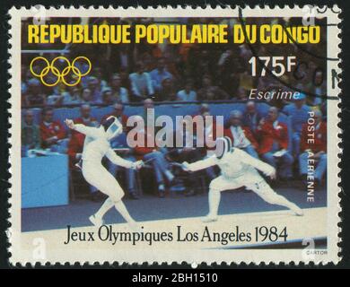 KONGO - UM 1984: Briefmarke gedruckt von Kongo, zeigt Fechten, um 1984. Stockfoto