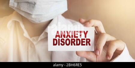 Angststörung, die auf einer Karte in Händen des Arztes geschrieben ist. Gesundheitswesen entspannen stressvollen Job Konzept Stockfoto
