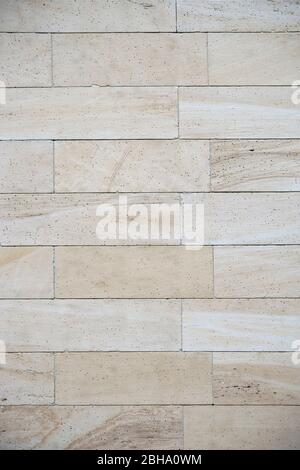 Ein helles Beige Mantel aus Marmor Sandstein mit Poren. Stockfoto