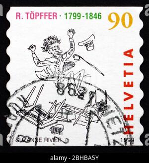 SCHWEIZ - UM 1999: Eine in der Schweiz gedruckte Briefmarke zeigt Comic Book, Les Amours de Monsieur Vieux Bois, von Rodolphe Topffer, um 1999 Stockfoto
