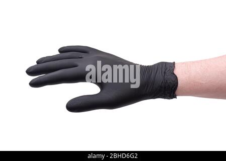 Hand in schwarzem Latex Handschuh isoliert auf weißem Hintergrund Stockfoto