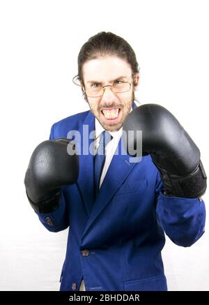 Ein Mann mit lboxing Handschuhe in buisness Stockfoto