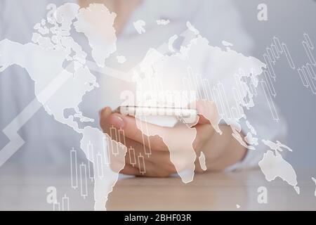 Das Konzept des globalen Geschäftswachstums auf der ganzen Welt auf einer Weltkarte. Nahaufnahme. Stockfoto