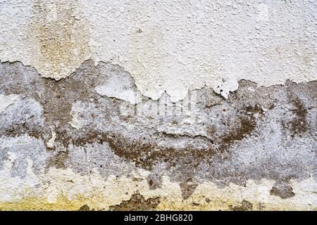 Gefallener Stuck auf Hauswand Hintergrund Stockfoto