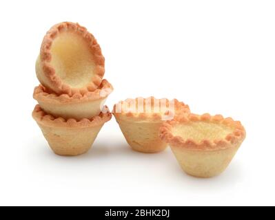 Gruppe von kleinen Tartlets auf weißem Hintergrund isoliert. Stockfoto