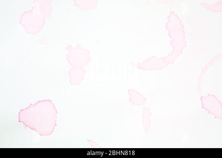 Weinfleck auf weißem Hintergrund Stockfoto