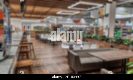 Abstrakte Unschärfe der Cafehalle. Kreatives Thema mit verschwommenem Hintergrund und Bokeh für Themenposter, Banner und Bildschirmschoner Stockfoto