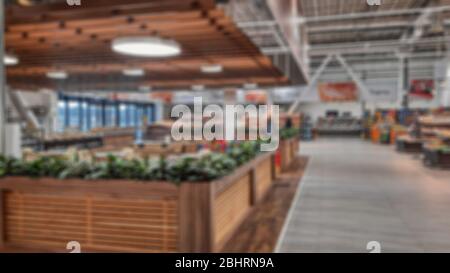 Abstrakte Unschärfe der Cafehalle. Kreatives Thema mit verschwommenem Hintergrund und Bokeh für Themenposter, Banner und Bildschirmschoner Stockfoto