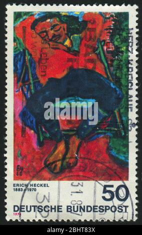 DEUTSCHLAND- UM 1974: Briefmarke gedruckt von Deutschland, zeigt Pechstein (Mann) schlafend, von Erich Heckel, um 1974. Stockfoto