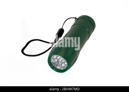 Tragbare LED-Taschenlampe grüne Farbe isolieren auf einem weißen Hintergrund. Stockfoto