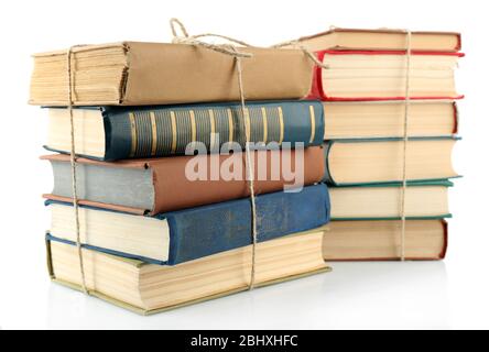 Stapel von Büchern isoliert auf weißem Stockfoto