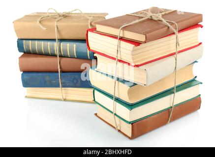 Stapel von Büchern isoliert auf weißem Stockfoto