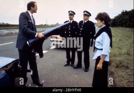 Im Uhrzeigersinn Jahr: 1986 Großbritannien Regie: Christopher Morahan John Cleese, Sharon Maiden Stockfoto