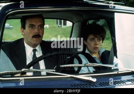 Im Uhrzeigersinn Jahr: 1986 Großbritannien Regie: Christopher Morahan John Cleese, Sharon Maiden Stockfoto