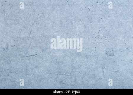 Grauer Betonhintergrund. Hintergrund mit Struktur und Muster aus Beton und Zement in grau. Stockfoto