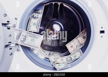 Geld in der Waschmaschine, Nahaufnahme Stockfoto