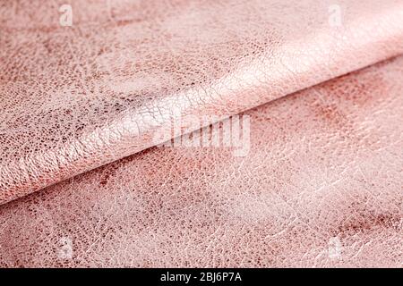 Hellbrauner Leder strukturierter Hintergrund Stockfoto
