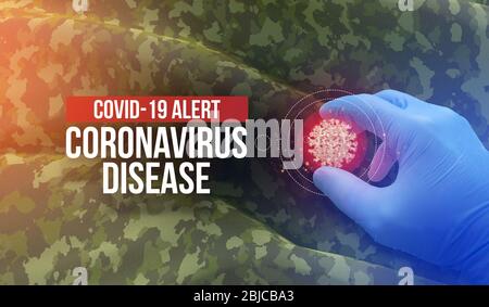 COVID-19 Alarm, Coronavirus Krankheit - Buchstaben Typografie Text. Medizinisches Virus molekulares Konzept mit Militär Krieg Khaki Hintergrund Tarnstoff Stockfoto