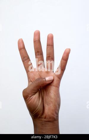 Schwarz african indian weibliche Hand zählen Stockfoto