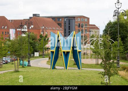 Der grüne Parkbereich bei Superkilen im dänischen Norrebro-Viertel bietet Spielräume und Kunstinstallationen. Stockfoto