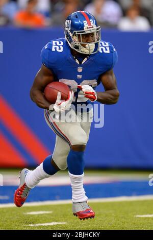 15. September 2013: New York Giants laufen zurück David Wilson (22) trägt den Ball während eines NFL Matchup der Woche 2 zwischen den Denver Broncos und den New Stockfoto