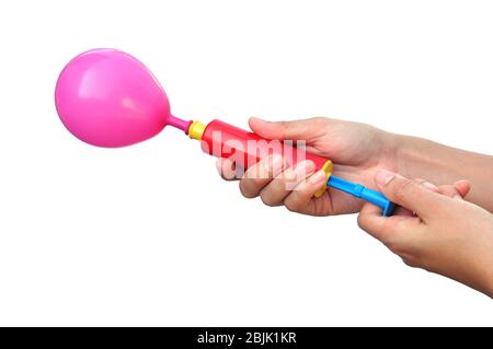 Luftpumpe und Ballon auf weißem Hintergrund. Stockfoto