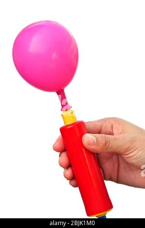 Luftpumpe und Ballon auf weißem Hintergrund. Stockfoto