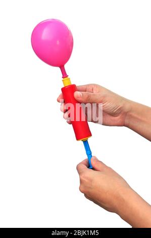 Luftpumpe und Ballon auf weißem Hintergrund. Stockfoto